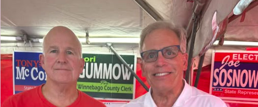 WCRCC Chairman Paul Hofmann and Illinois State Senator Dave Syverson stand together inside the Republican Party tent at the 2024 Boone County Fair.